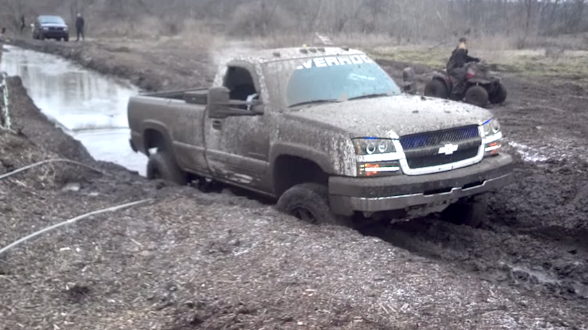 Lifted Chevy Goes Muding