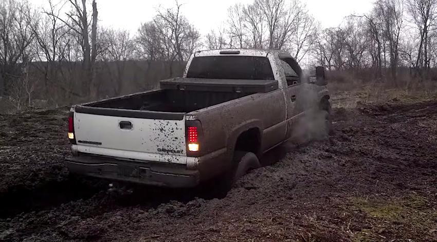 Lifted Chevy Goes Muding