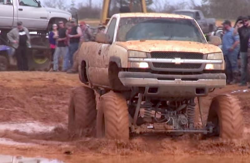 Dirty Silverado floats through the mud  