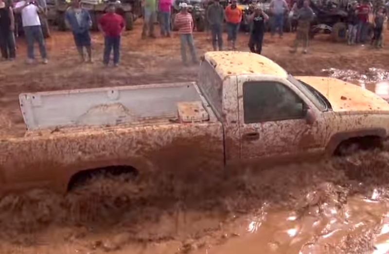 Dirty Silverado floats through the mud  