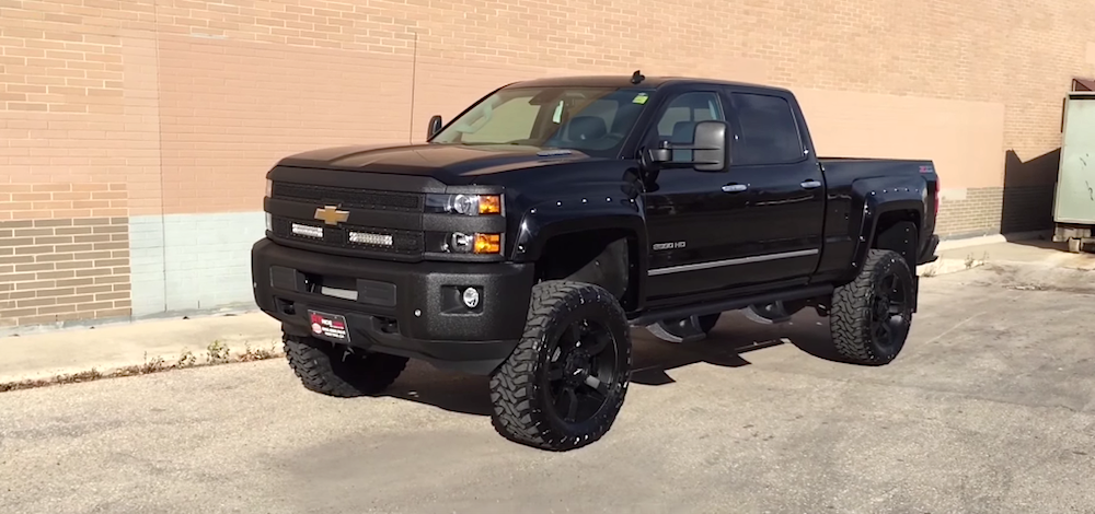 None more black  Check out this lifted  Silverado 2500HD 